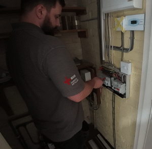 Electrician carrying out EICR testing in Cambridge